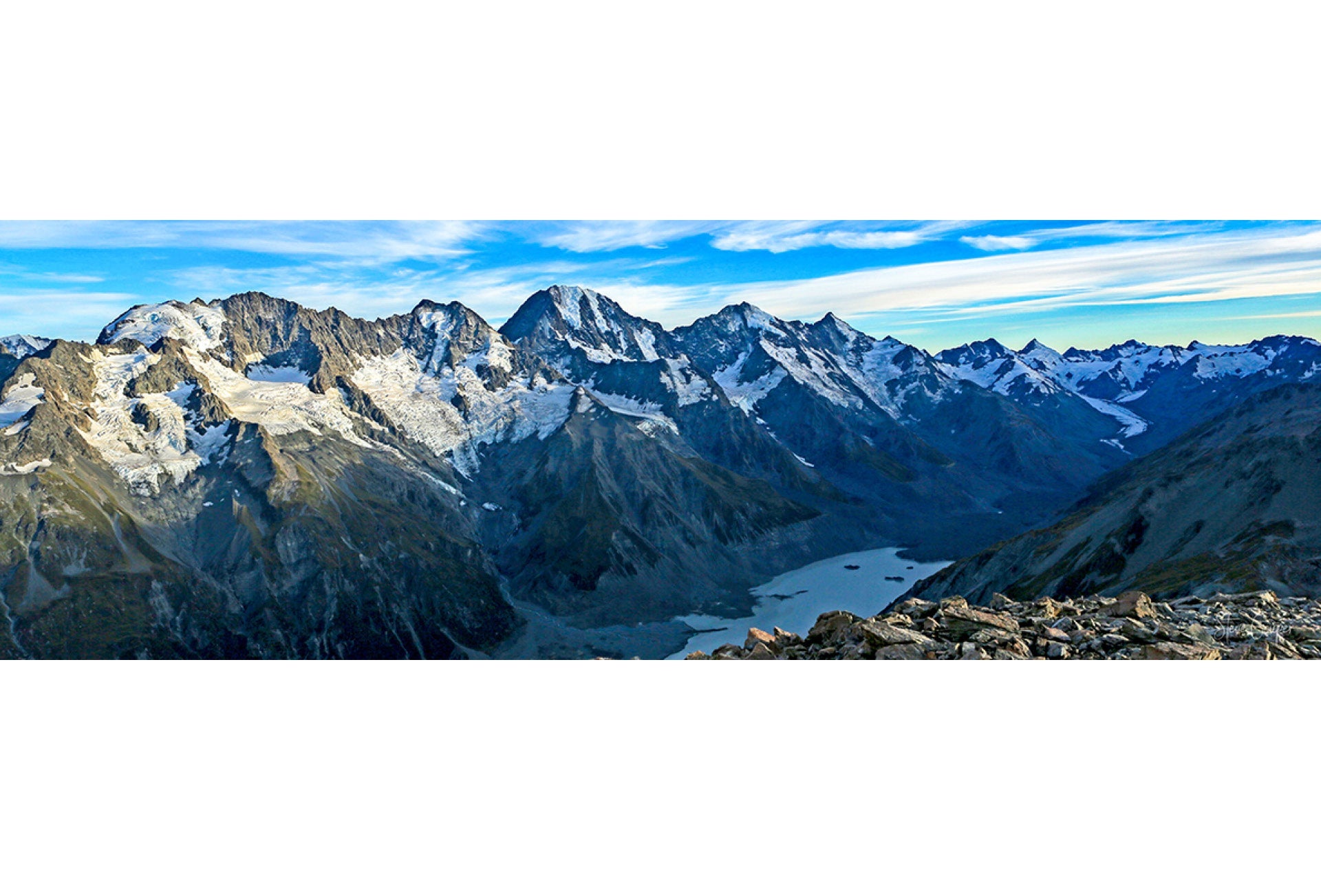 Secluded Murchison Valley in Mt Cook National Park South Island New Zealand, with towering peaks, ancient glaciers, and pristine rivers under dramatic skies